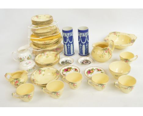 A Crown Ducal part tea service in Florentine pattern comprising six tea plates, six cups and saucers, six bowls, six larger p