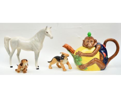 A Royal Doulton figure of a standing dapple grey horse, a Minton Archive Collection limited edition monkey teapot and two Hut