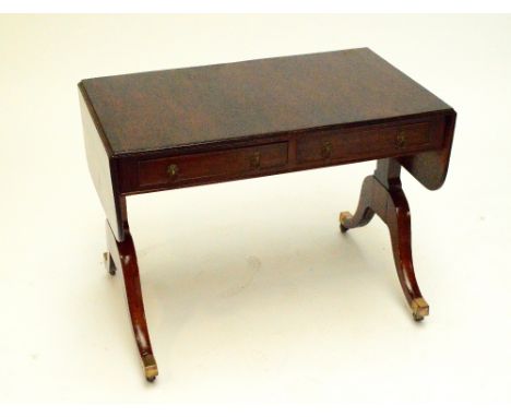 A Victorian mahogany two drawer sofa table with brass handles.