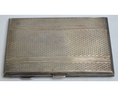 A George VI hallmarked silver rectangular cigarette case with engine turned decoration, Birmingham 1951, 12.5 x 8.5cm, approx