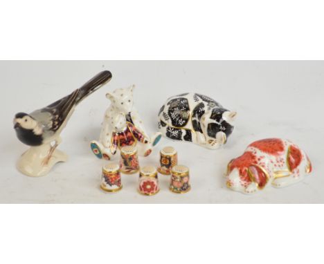 Two Royal Crown Derby paperweights; a puppy and a kitten, both with gold stoppers, a Royal Crown Derby group of two bears, fi