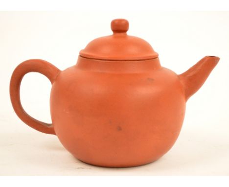 A 19th century Chinese Yixing spherical teapot, impressed seal mark to base, length 19.5cm.