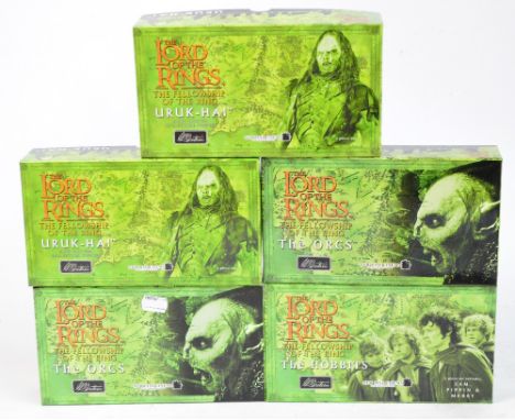 Five boxed W.Britain Lord of the Rings figures; 2 x The Orcs, The Hobbits, and 2 x Uruk-Hai.