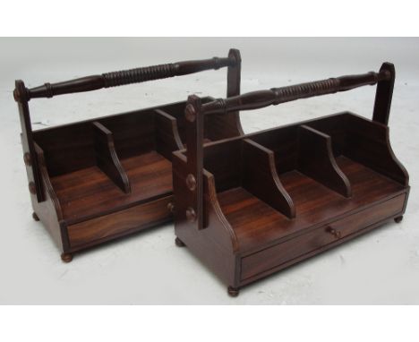 A pair of modern reproduction book trough carriers with frieze drawer and fixed carrying handle, width 64cm.