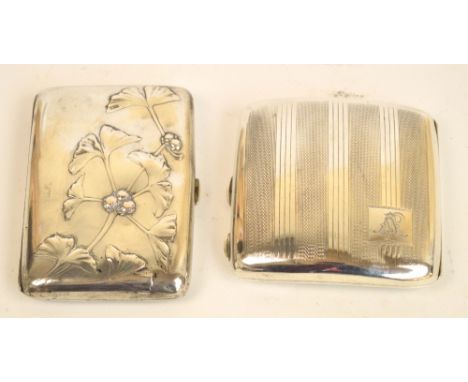 A George V hallmarked silver curved cigarette case with striped engine turned decoration and monogrammed cartouche, Robert Pr