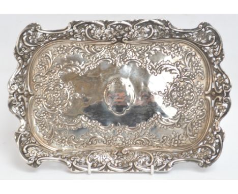 An Edwardian hallmarked silver Art Nouveau design rectangular shallow tray with pierced border and embossed central panel, Bi