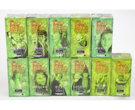 Eleven boxed W.Britain hand painted Lord of the Rings figures; Bilbo, Aragorn, Gandalf, Galadriel, Boromir, Frodo, Saruman, L