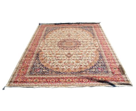A beige ground Keshan carpet, 280 x 200cm.