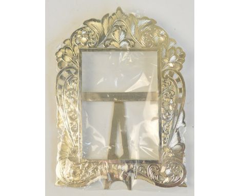 An Armenian silver photograph frame with pierced and engraved foliate and scroll decoration with easel back, 9 x 6cm, approx 