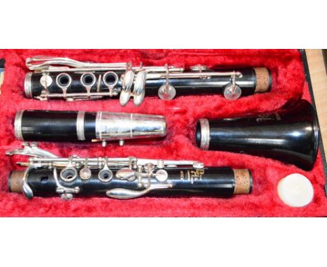 A cased Bossey & Hawkes Regent clarinet.