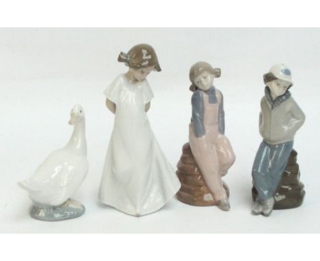 Two Nao figure depicting a girl in a white dress and a goose, also a pair of Nadal figures depicting a boy and a girl leaning