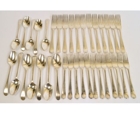 A set of George V hallmarked silver twelve setting flatware comprising table forks, dessert forks and dessert spoons, each en