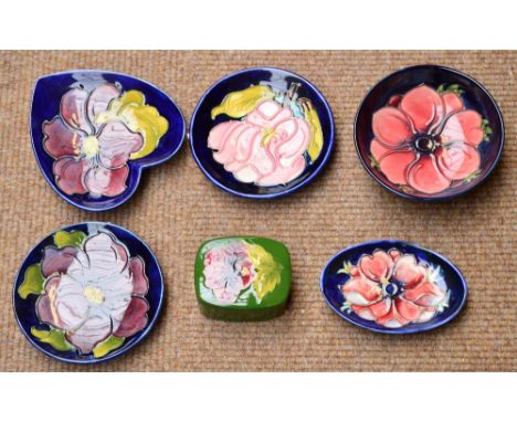 Six modern pieces of Moorcroft including three circular shallow bowls, diameter each approx 11.5cm, a heart shaped trinket di