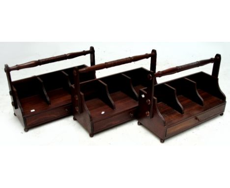Three modern reproduction book trough carriers with single drawer and fixed carrying handle, width 64cm.