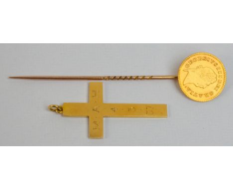 An 18ct gold cross engraved with initials and dated 1937, approx 4.3g, and a coin stick pin, approx 4.2g (2).