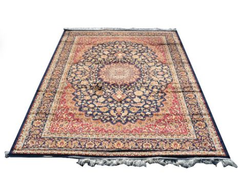 A blue ground Keshan carpet, 230 x 160cm.