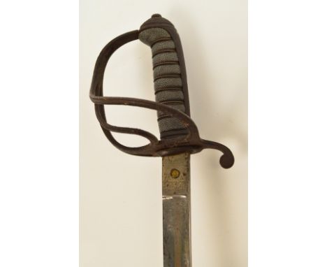 A Victorian 1850 pattern Royal Artillery officer's dress sword and scabbard, with etched foliate decorated blade by Buckmaste