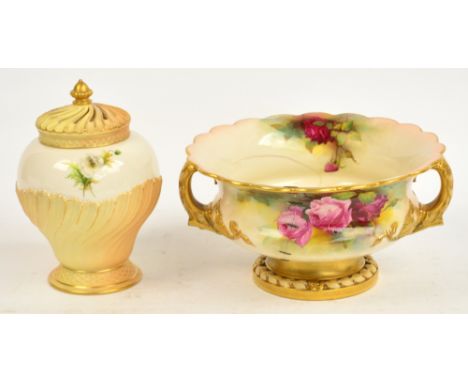 An early 20th century Royal Worcester pot pourri bowl in blush ivory with gilt heightened swirl pattern and painted poppy dec