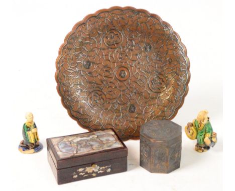 A Middle Eastern copper and white metal overlaid platter, diameter 24cm, a Chinese white metal octagonal canister, two Chines