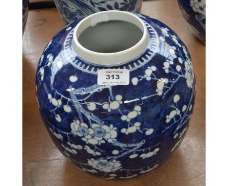 A late 19th century porcelain jar painted in underglaze blue with blossoming prunus, bears underglaze blue four character Kan