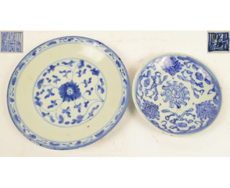 An 18th century Chinese Export porcelain dish painted in underglaze blue with a lotus spray, bears underglaze blue seal mark 