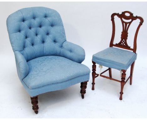 A late Victorian button upholstered tub armchair raised on ring turned front legs, and three dining chairs with pierced vase 