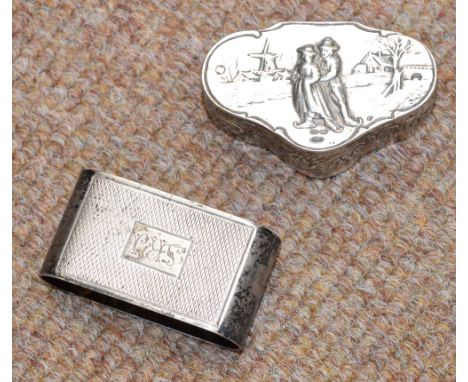 A George VI hallmarked silver napkin ring of squashed oval form with engine turning and monogrammed cartouche, H.F. Withers, 