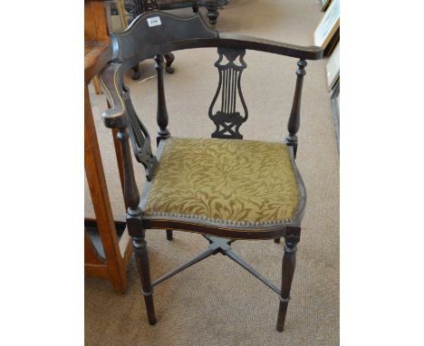 A late 19th century mahogany corner chair with string inlay, lyre splats and engine turned legs.
