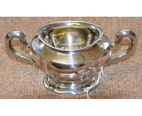 A German post-1888 silver twin handled sucrier raised on spreading oval foot, length 20.5cm, approx 7.5ozt.