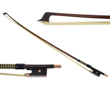 A gold mounted violin bow by R Weichold , Dresden, stamped to the shaft.