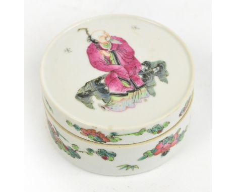 A c.1900 Chinese porcelain Famille Rose circular seal paste box and cover, the lid finely painted with a seated elder, the si