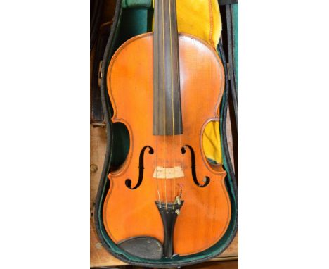 A full size French violin with one-piece back, Stradivarius copy, the printed label dated 1905, length of back 36cm, cased wi