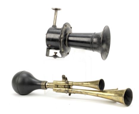 A brass three-trumpet 'Le Testophone' bulb horn, French,with mounting bracket, making good sound but require some realignment