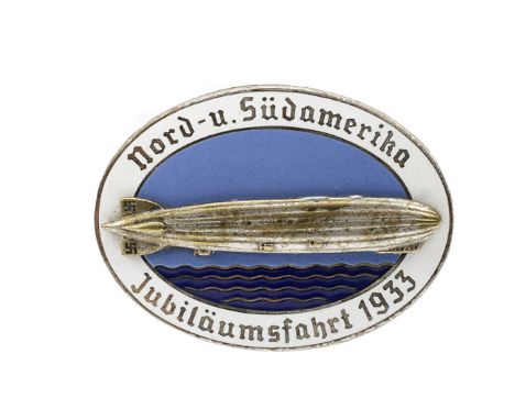 A 'Jubilaumsfahrt 1933' Graf Zeppelin enamel pin badge, German,by Kerbach of Dresden, oval nickelled badge in blue and white 