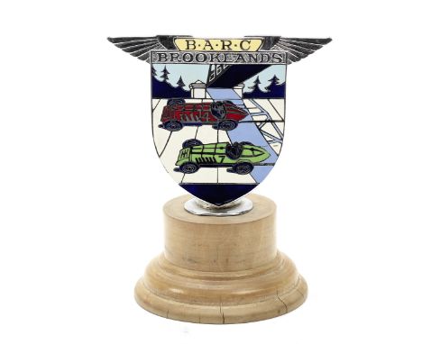 A BARC Brooklands member's badge, British 1930s,number 908, by Spencer of London, chromed with eight colour enamel design, 9.