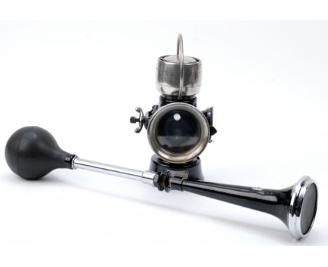 A Lucas tail lamp and a Desmo horn,comprising type 630 numberplate lamp, 1920s, Japanned black with nickelled brightwork, 3 i