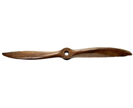 A wooden propeller from a Martinsyde F4 Buzzard biplane, circa 1918,twin bladed laminated wood, central hub with 4 sections o