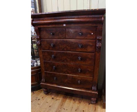 Victorian mahogany Scotch chest, the top having hinged secret compartment above two short and four long drawers on a turned l