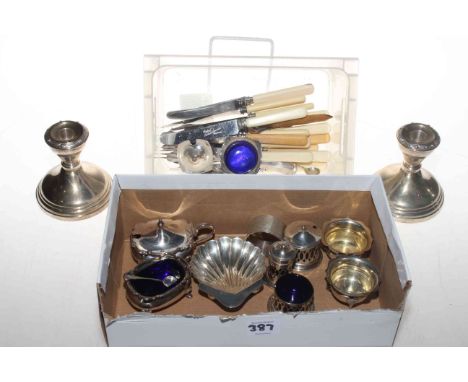 Collection of silver small pieces including pair dwarf candlesticks, shell butter dish, cruets, napkin ring, plated flatware 