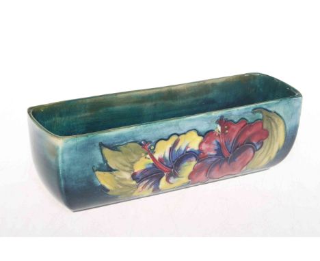 Moorcroft Pottery Hibiscus trough shaped vase, 19.5cm across, bearing worn warrant label.