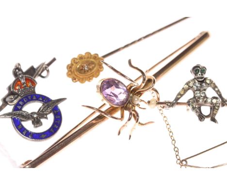 Large 9 carat gold insect bar brooch with amethyst, 15 carat gold stick pin, RAF brooch and monkey bar brooch (4).