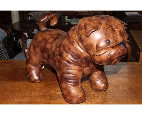 Leather French bulldog pouffe stool.