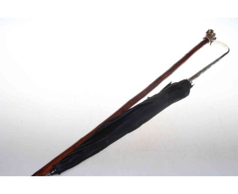 '800' silver snake and embossed handled umbrella, and dogs head walking stick (2).