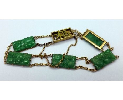 A Chinese 18ct gold and jade bracelet