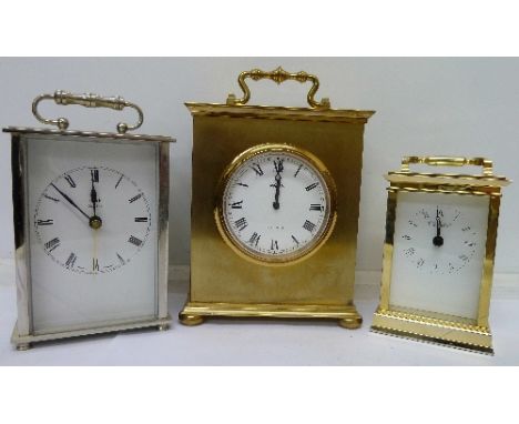 An Angelus electronic mantel clock with brass case, a Metamec quartz mantel clock and one other brass cased clock