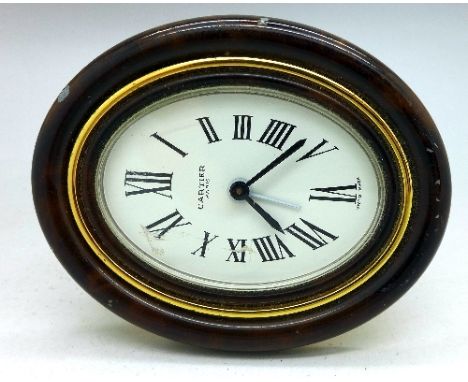 A Cartier travel alarm clock, a/f