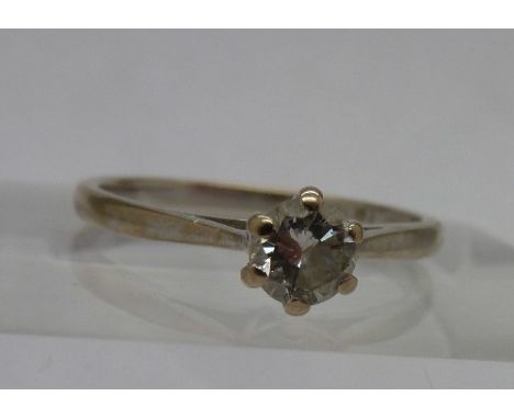 An 18ct white gold and diamond solitaire ring, weight 2g, size L