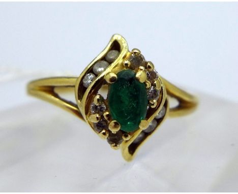 A 14ct gold, emerald and diamond ring, weight 2.4g, size K