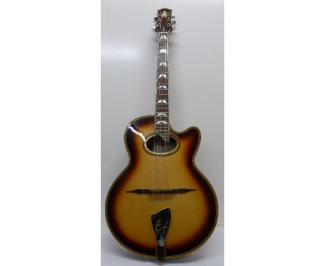 An arch backed jazz guitar by Arrow