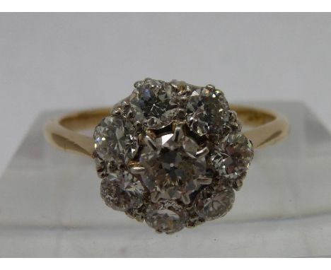 A vintage 18ct gold and diamond cluster ring, approximately 1ct diamond weight, total weight 3g, size Q